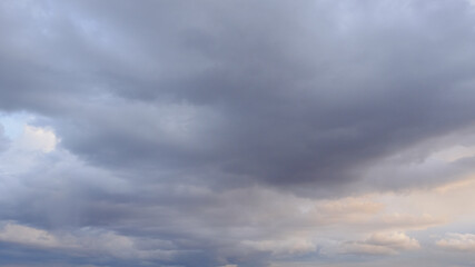 Gray cloudy sky as background. Dramatic sky.