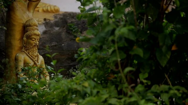 murudeshwar temple statue in jungle
