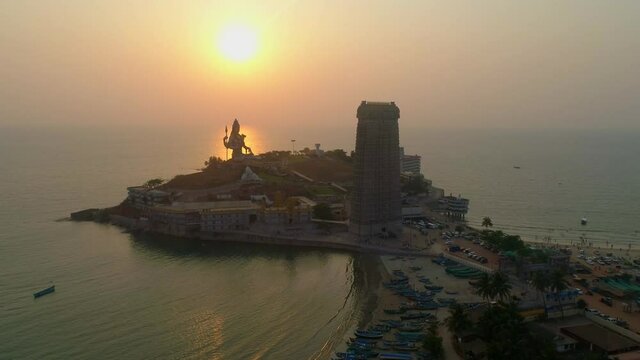 murudeshwar shiva statue south india drone sunset round beach and sea