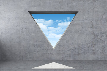 sky through triangular hole wall