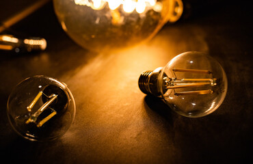light bulbs on dark background idea and innovation