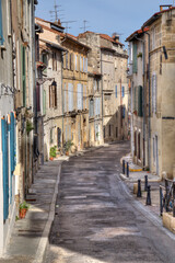 Street with historical houses in Arles, France