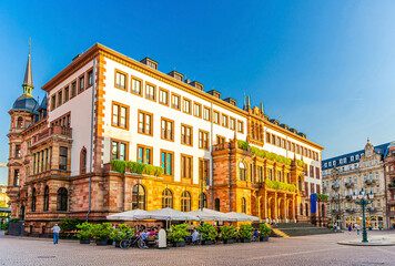 Wiesbaden City Palace Stadtschloss or New Town Hall Rathaus neo-classical style building on Schlossplatz Palace Square in historical city centre, blue sky background, State of Hesse, Germany - obrazy, fototapety, plakaty