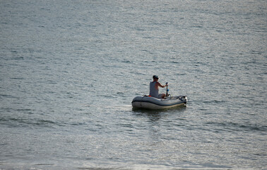 Fototapeta na wymiar person rowing in his boat