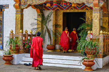 Bhutan, Thimphu -   Buddhist monks in traditional robes at the Trashi Chhoe Dzong