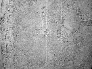 black and white rough cement wall texture with cracks, a background pattern
