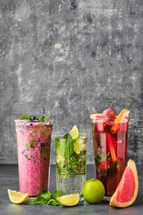 Three glasses with fruit refreshing drink