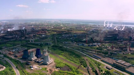 panorama of blast furnaces and other elements of the black metallurgical industries and the chemical industry in Cherepovets, a view of the structure from a height.