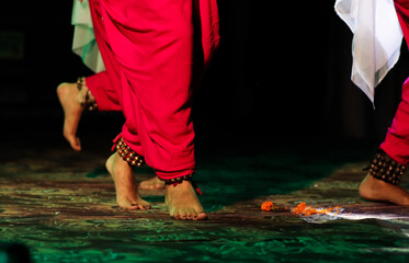 indian classical dance form in feet with musical anklet with selective focus and blur