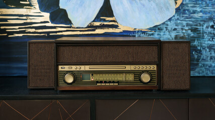 Vintage style music center on wooden counter