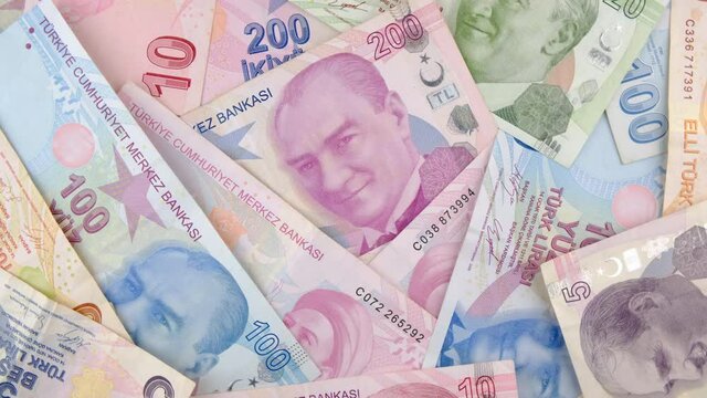 Lira banknotes. Various Turkish lira banknotes turning background.