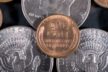 one dollar and one cent coins