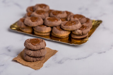 chocolate and quince cookies on marble