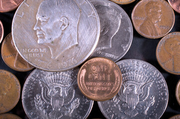 one dollar coin plus one cent