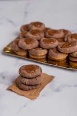 chocolate and quince cookies on marble