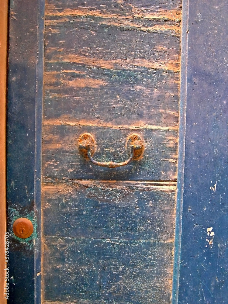 Poster italy, marche, recanati, very old door handle.