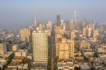 Fototapeta na wymiar San Francisco Skyline Through Hazy Golden Hour