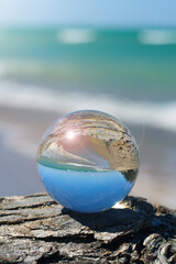 Fototapeta na wymiar Crystal ball for optical illusion. Nature view through a crystal ball.
