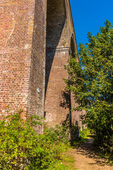 A view looking up towards the Chappel Viaduct near Colchester, UK in the summertime