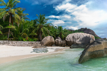 Obraz na płótnie Canvas Beautiful tropical beach Anse Source d´Argent with sculpted granite rocks and palm trees. Seychelles is the most beautiful tropical islands of the world's in the Indian Ocean.