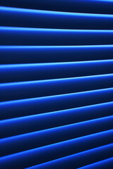 Obraz premium Blue shutter blinds in a sunny day