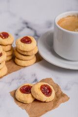 quince cookies on marble board with coffee