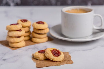 quince cookies on marble board with coffee