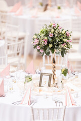 Wedding flower bouquet on a decorated festive table