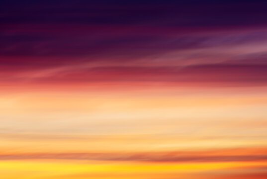 Blurry image of dramatic sunset sky. Abstract creative background