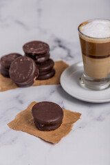 Coffee with milk and Dulce de Leche cones with sweet chocolate cones