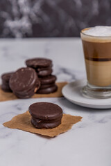 Coffee with milk and Dulce de Leche cones with sweet chocolate cones