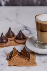 Coffee with milk and Dulce de Leche cones with sweet chocolate cones