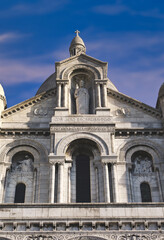 Fototapeta premium The Basilica of the Sacred Heart of Paris, commonly known as Sacré-Cœur Basilica, located in the Montmartre district of Paris, France.