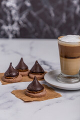 Coffee with milk and Dulce de Leche cones with sweet chocolate cones