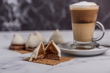 Coffee with milk and Dulce de Leche cones with sweet chocolate cones