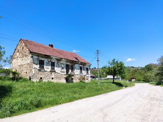 Fototapeta na wymiar Old ruined abandoned house , Bistrita,Slatinita,Romania,