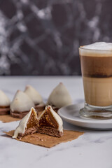 Coffee with milk and Dulce de Leche cones with sweet chocolate cones