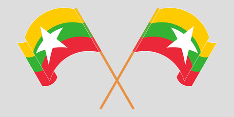 Crossed and waving flags of Myanmar