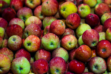 heap of apple for sale in market