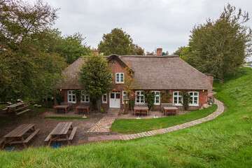 Old house with thatched roof in northern Germany.