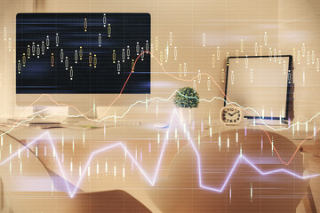 Multi exposure of stock market chart drawing and office interior background. Concept of financial analysis.