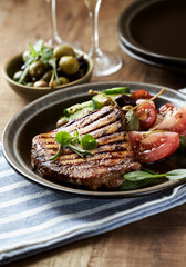 Grilled Turkey Breast with fresh salad. Close up.	