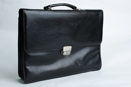 Black briefcase depicted on a white background