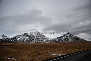 Mountains with snow and clouds in an Icelandic landscape