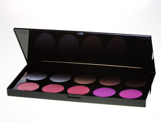 make-up collection close up over white background