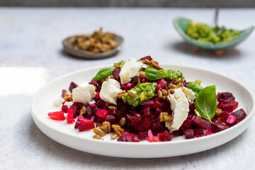 Beetroot salad with pesto and goat cheese