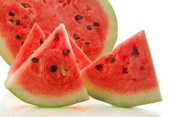 Watermelon and watermelon slices on white isolated background