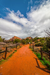 Bright path leading up to the red hills near Sedona, AZ, USA