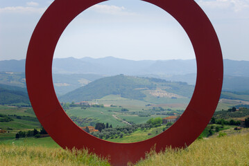 Large circle in Tuscan countryside with view of Elsa Valley