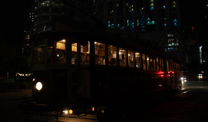 Fototapeta na wymiar Tram night ride in Dallas downtown